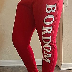 Red and white BORDOM sweatpants